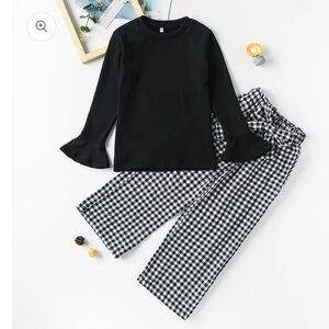 Fancy in plaid 2pc set sizes available 6-7yrs and 10-11 years pants set